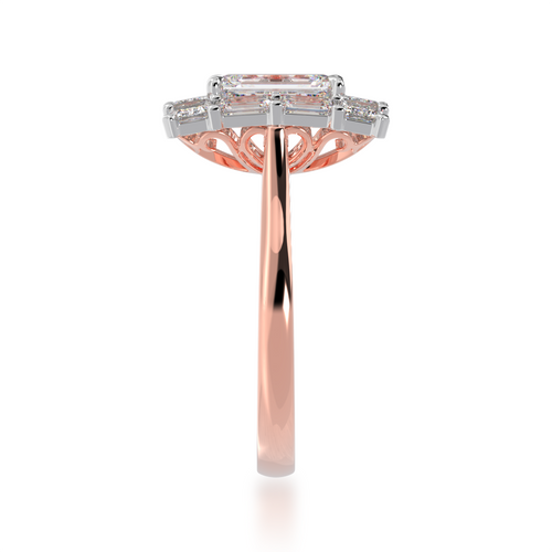 Standing side view of the Emerald cut diamond cluster ring on rose gold band.