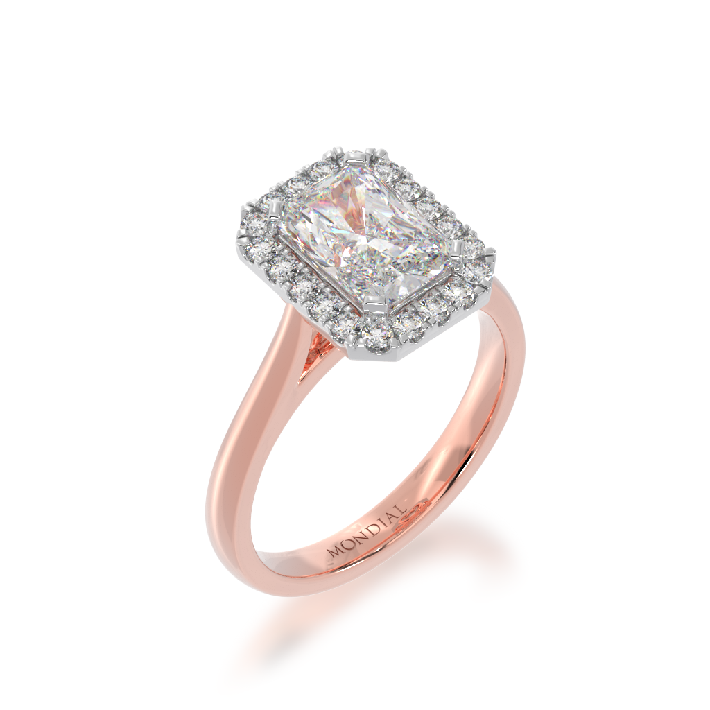 Radiant cut diamond halo engagement ring on rose band view from angle 