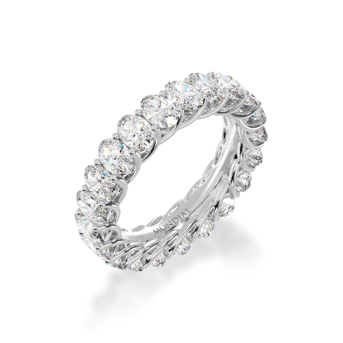 Oval cut diamonds claw set full circle eternity ring view from angle.