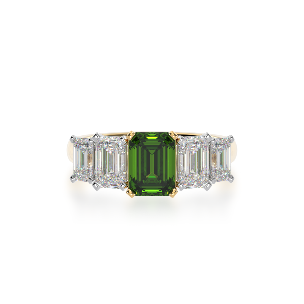 Five stone emerald cut green sapphire and diamond ring on a yellow band view from top 