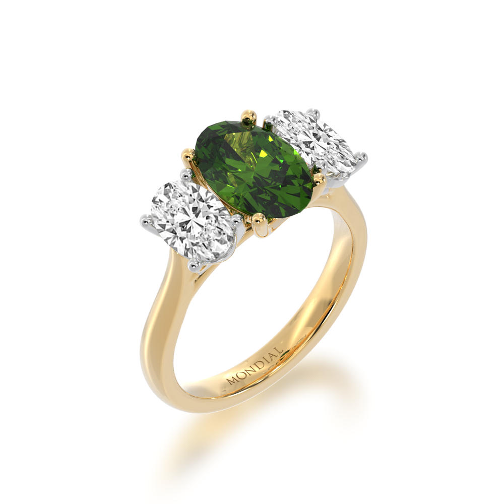 Trilogy oval cut green sapphire and diamond ring on a yellow gold band view from angle 