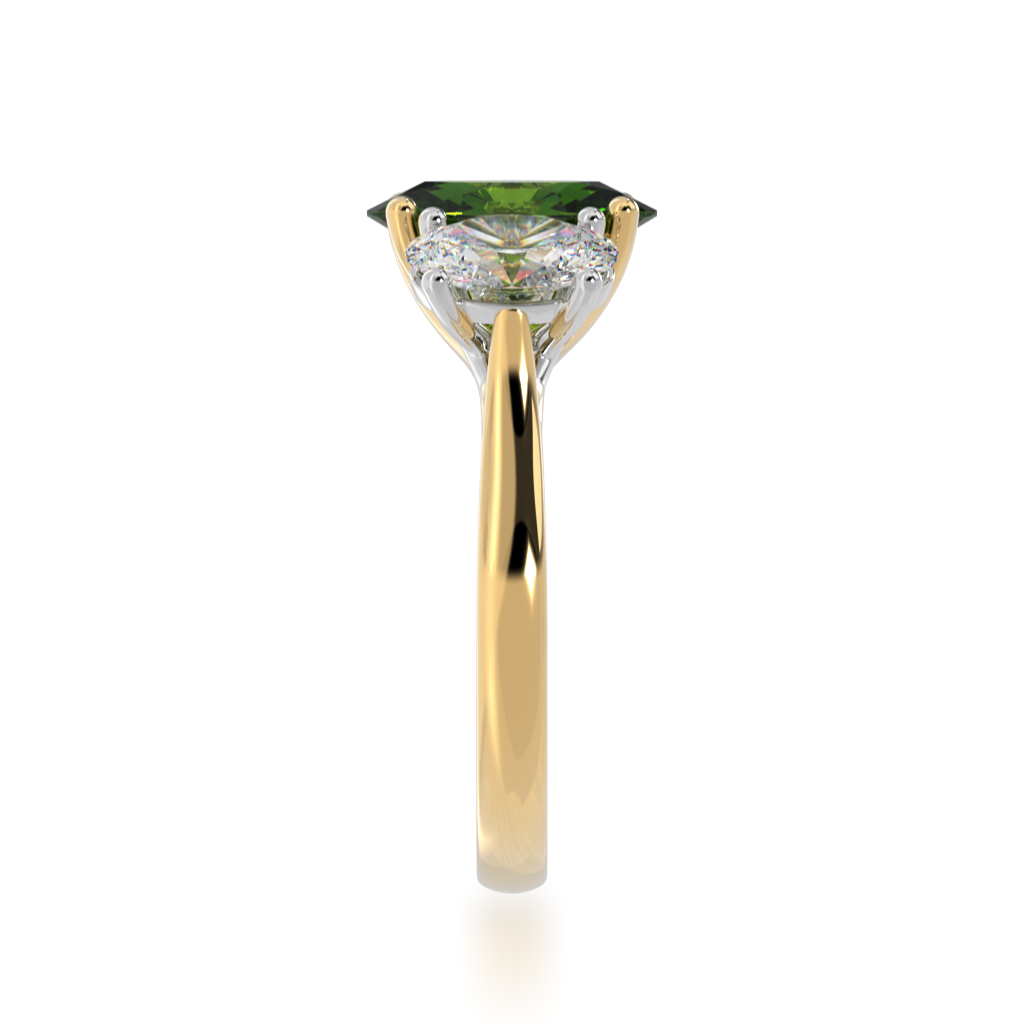Trilogy oval cut green sapphire and diamond ring on a yellow gold band view from side 