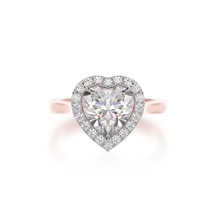 Heart shape diamond halo engagement ring on rose band