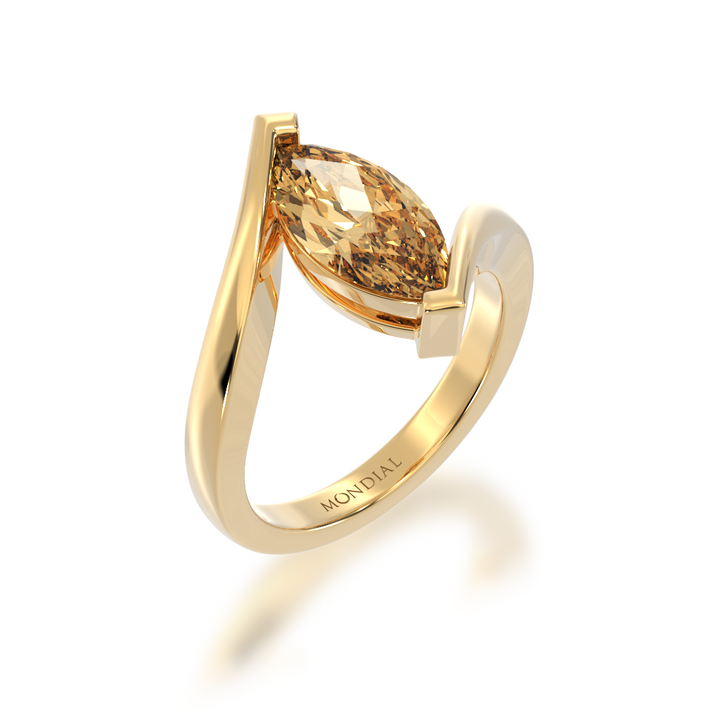Marquise cut champagne diamond solitaire set in yellow gold bordeaux design ring view from angle
