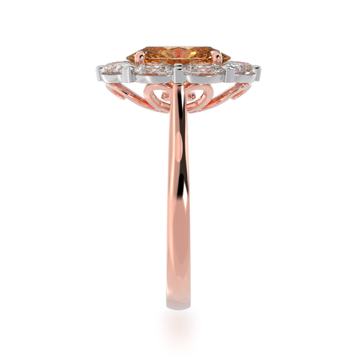 The Mondial by Nadia oval cut engagement ring with champagne diamond cluster ring on rose gold band view from side.