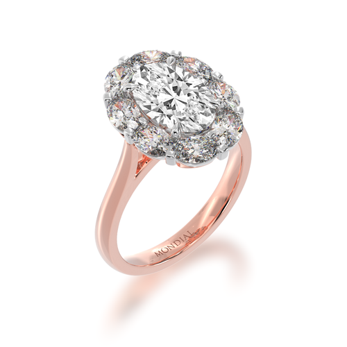 The Mondial by Nadia Cluster Oval diamond ring surrounded by an oval halo on rose gold band from a standing 45 degree view.