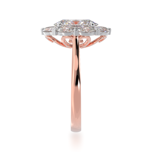 The Mondial by Nadia Cluster Oval diamond ring surrounded by an oval halo on rose gold band standing side view.