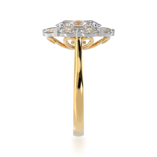 Cluster Oval diamond ring with a surrounding halo of ovals on a yellow gold band standing side view.