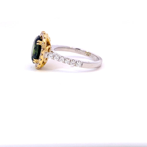 Oval cut green sapphire diamond halo ring with diamond band