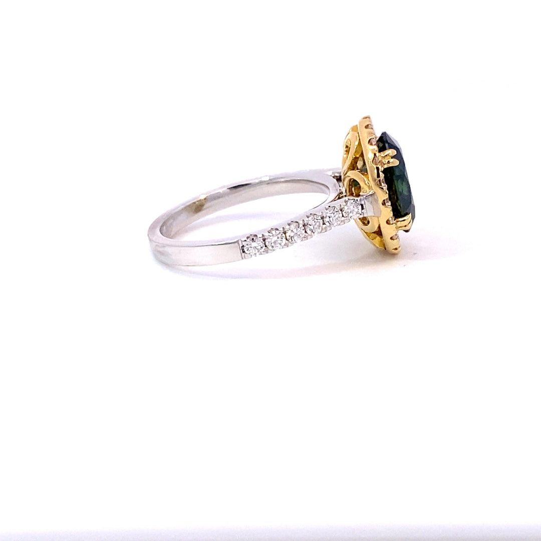 Oval cut green sapphire diamond halo ring with diamond band