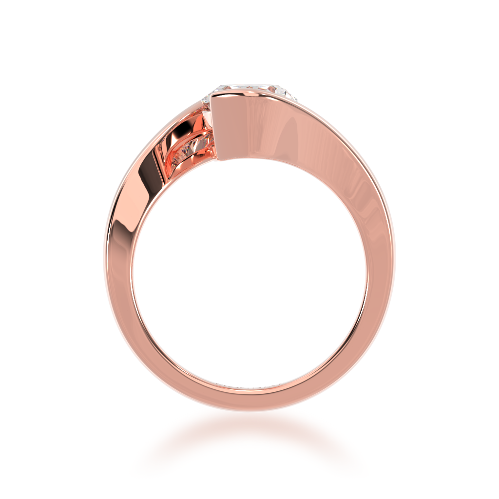 Oval cut diamond solitaire set in rose gold Bordeaux design ring