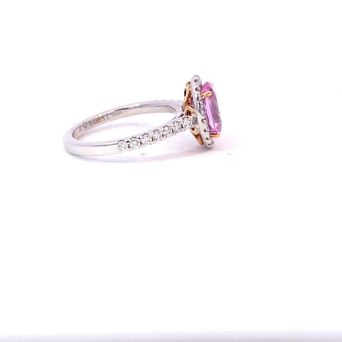 Oval cut pink sapphire diamond halo ring with diamond band