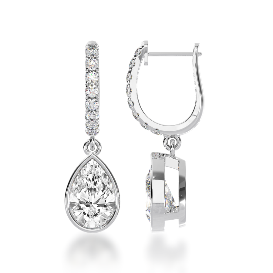 Pear shape bezel set diamond drop earrings on a diamond set huggie view from side 