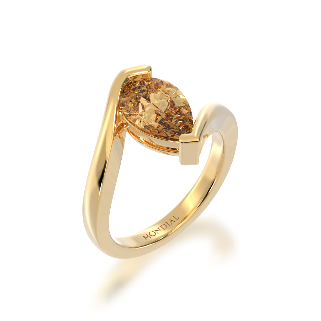 Pear shaped champagne diamond solitaire set in yellow gold bordeaux design ring view from angle 