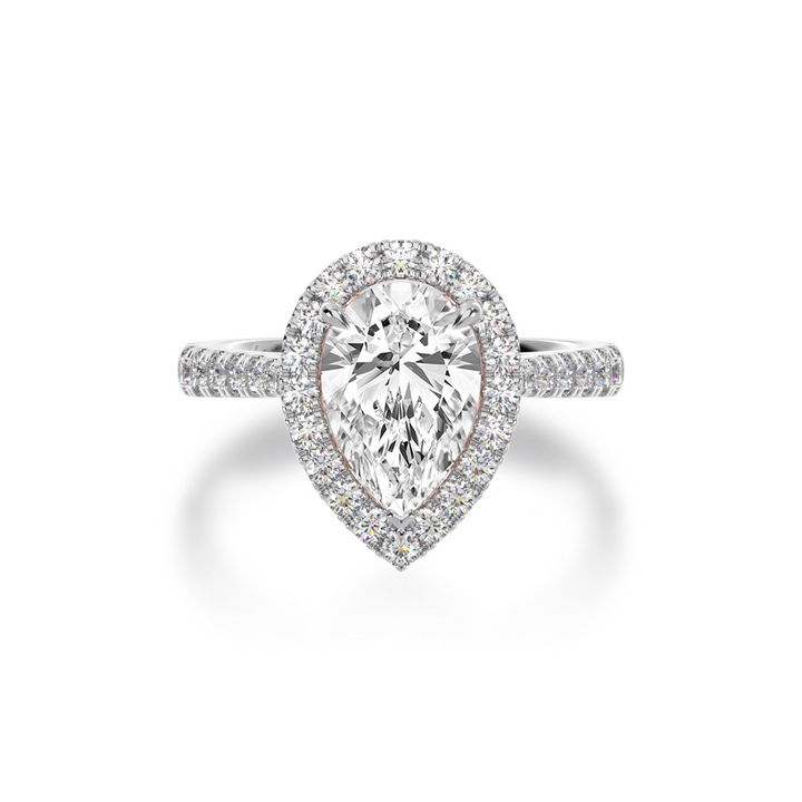 Pear shape diamond halo engagement ring with diamond set band view from top