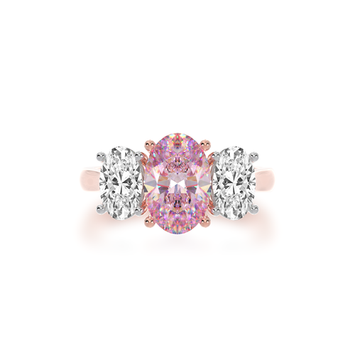 The Mondial by Nadia Trilogy oval diamond ring with a pink sapphire on rose gold band view from top.