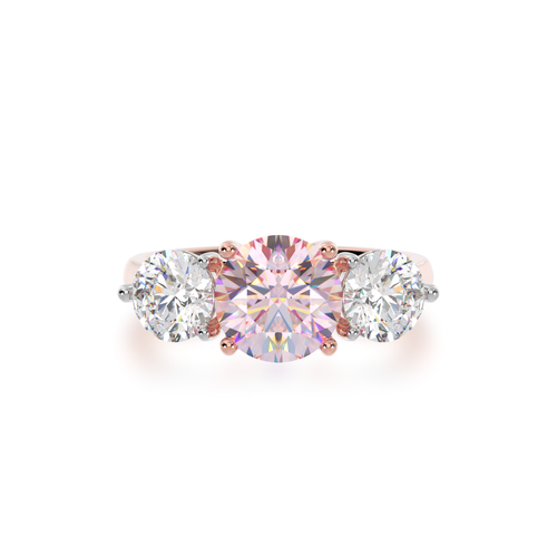 Trilogy round brilliant cut pink sapphire and diamond ring on rose gold band view from top