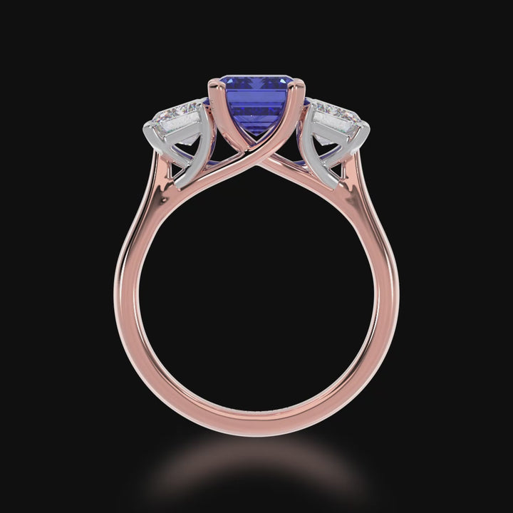 Trilogy emerald cut blue sapphire and diamond ring on rose gold band 3d view 