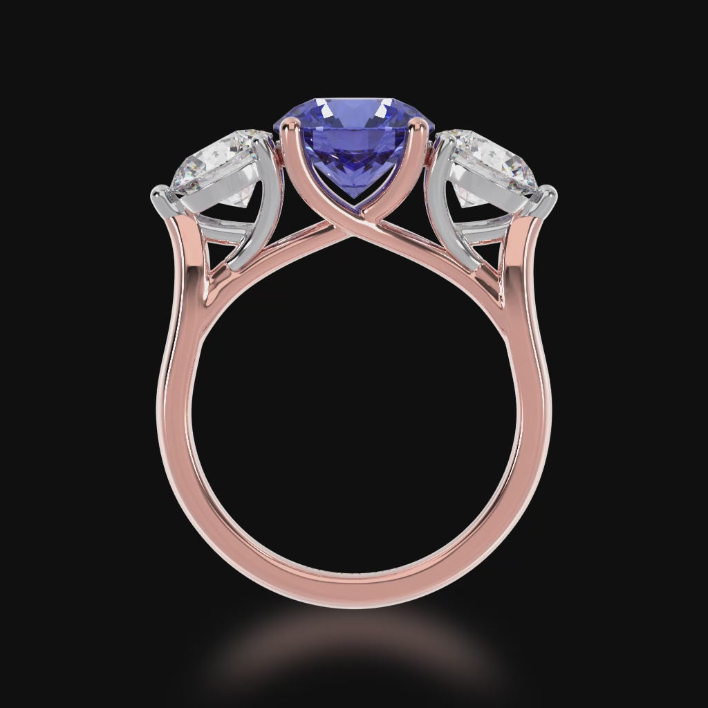 The Mondial by Nadia Round Brilliant cut trilogy blue Sapphire engagement ring with diamonds on rose gold band 3d video.