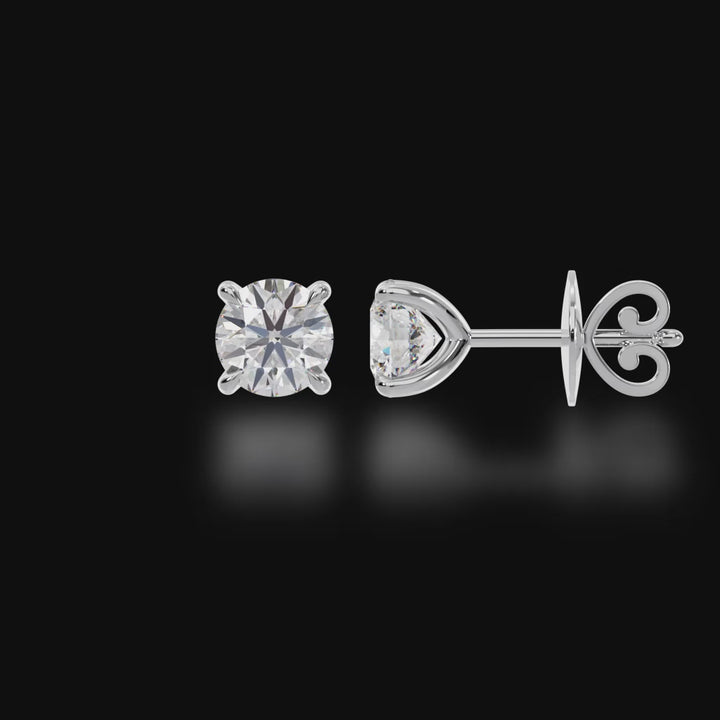 Four claw round brilliant cut diamond stud earrings 3d video