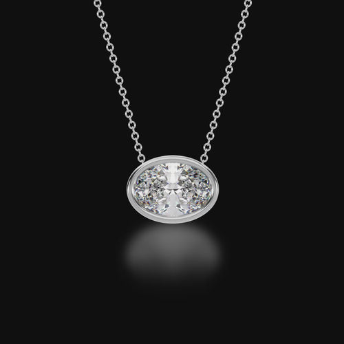 Oval cut white diamond bezel set pendant