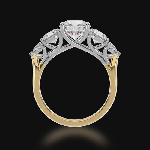 5 stone round brilliant cut diamond ring on a yellow gold band