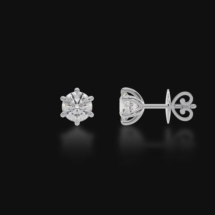 Six claw round brilliant cut diamond stud earrings 3d video