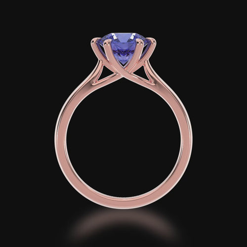 3D video of the Brilliant cut blue sapphire engagement ring solitaire design on a rose gold band by Mondial by Nadia.