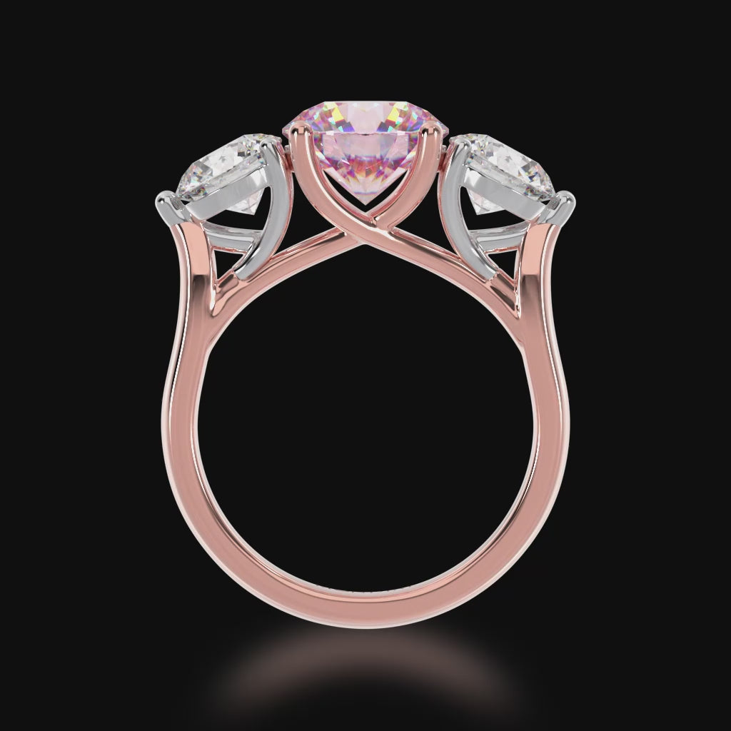 Trilogy round brilliant cut pink sapphire and diamond ring on rose gold band 3d video