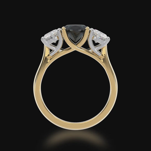 Trilogy oval cut black sapphire and diamond ring on yellow gold band 3d video.