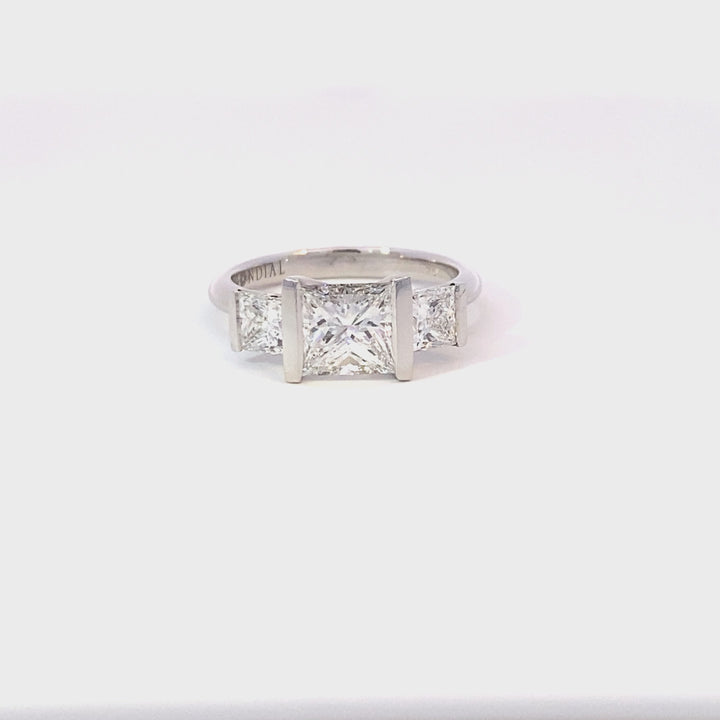 Trilogy princess cut diamond ring on white gold band