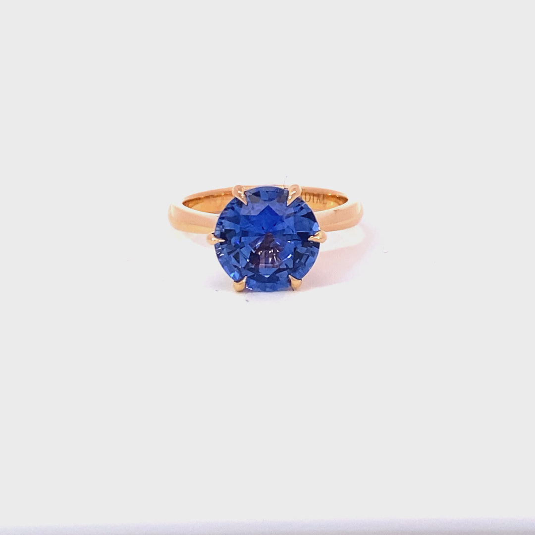 Round brilliant cut Ceylon blue sapphire ring on rose gold band