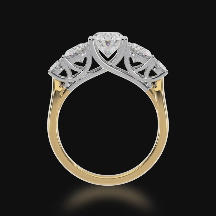 Five stone oval diamond ring on a yellow gold band 3d video