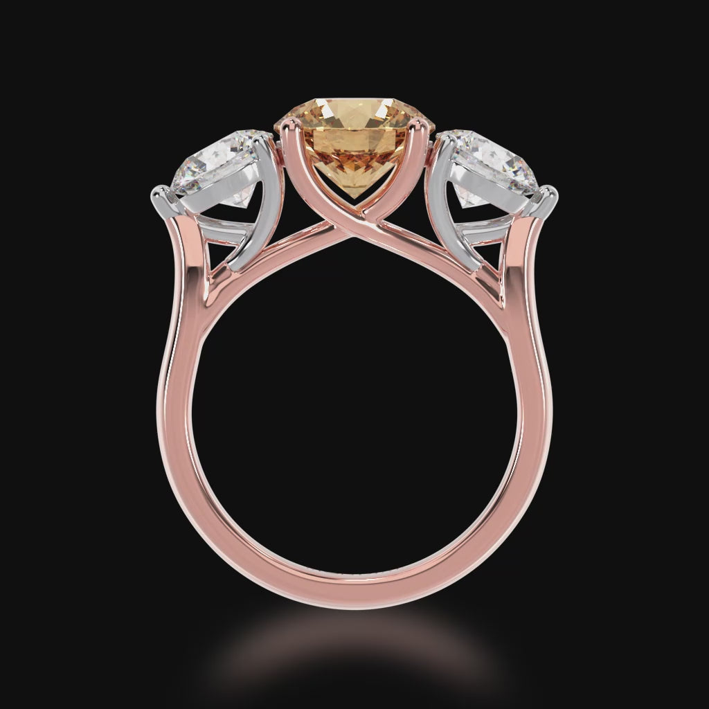 Trilogy round brilliant cut champagne and diamond ring on rose gold band 3d video