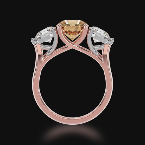 Trilogy round brilliant cut champagne and diamond ring on rose gold band 3d video