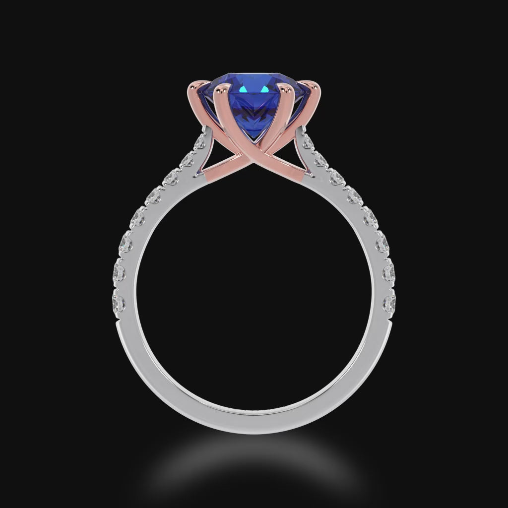 The Mondial by Nadia Round brilliant cut solitaire blue sapphire engagement ring with diamond set band 3d view.