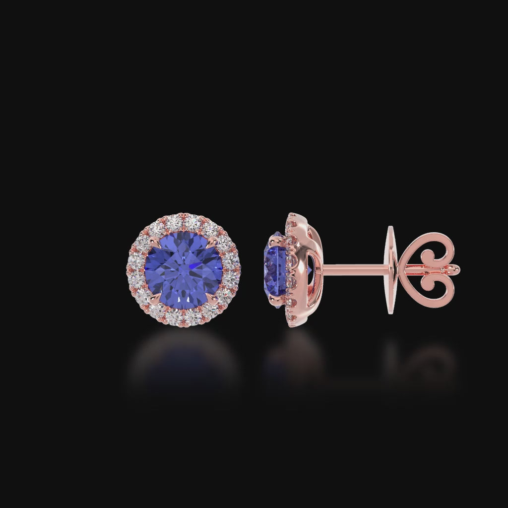 Round brilliant cut blue sapphire and diamond halo stud earrings 3d video
