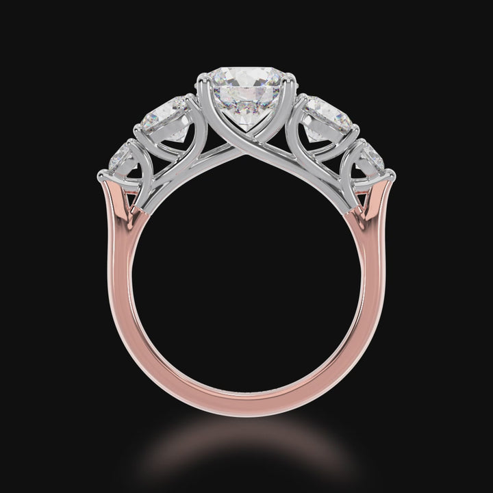 5 stone round brilliant cut diamond ring on a rose gold band