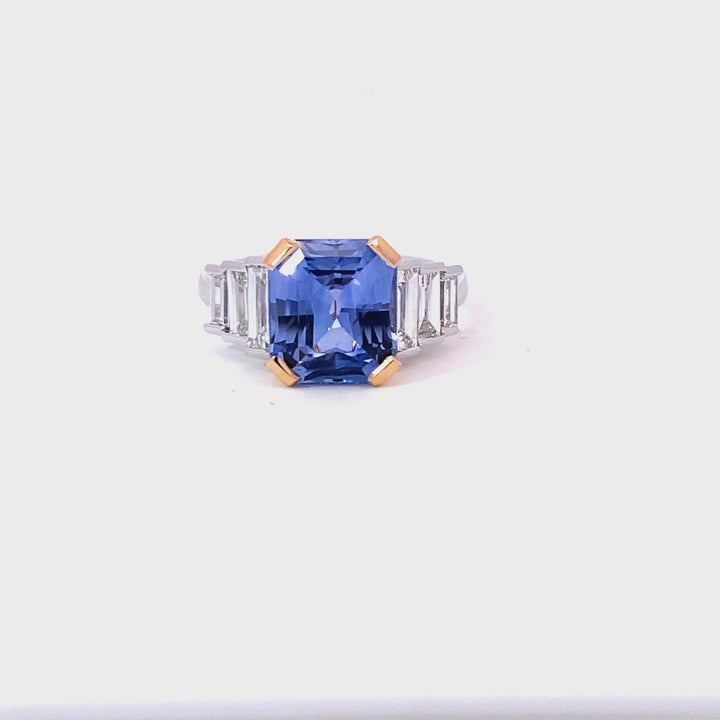 Radiant cut Ceylon blue sapphire and diamond ring on white gold band