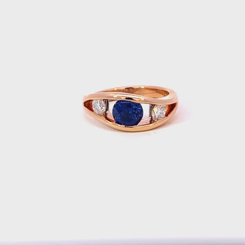 Flame design blue Ceylon sapphire and diamond ring