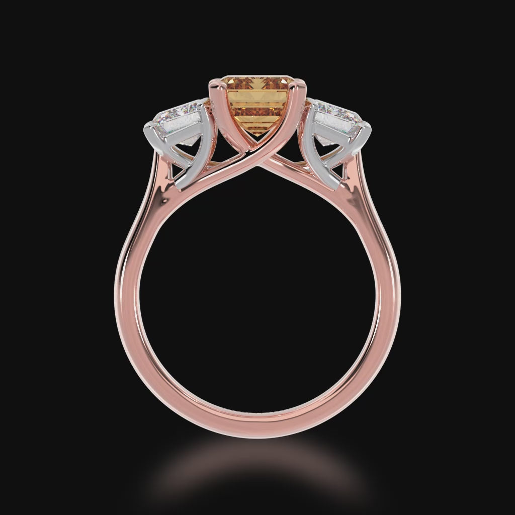 Trilogy emerald cut champagne and diamond ring on rose gold band 3d video