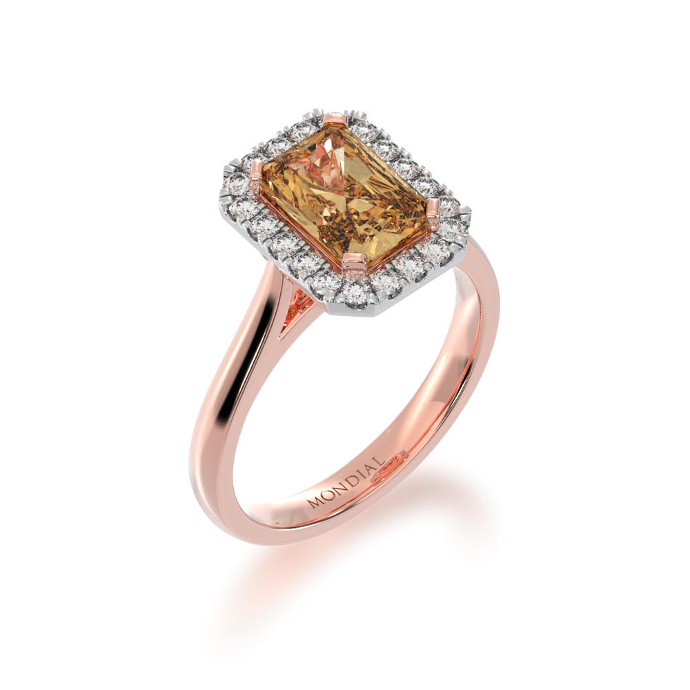 Radiant cut champagne diamond halo engagement ring on rose gold band view from angle