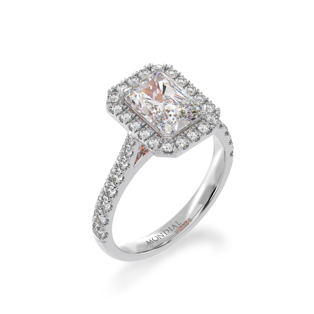 Radiant cut diamond halo engagement ring with diamond set band view from angle 