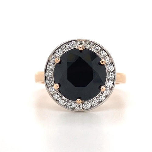 The Mondial by Nadia Round brilliant cut black sapphire diamond halo ring on rose gold band.