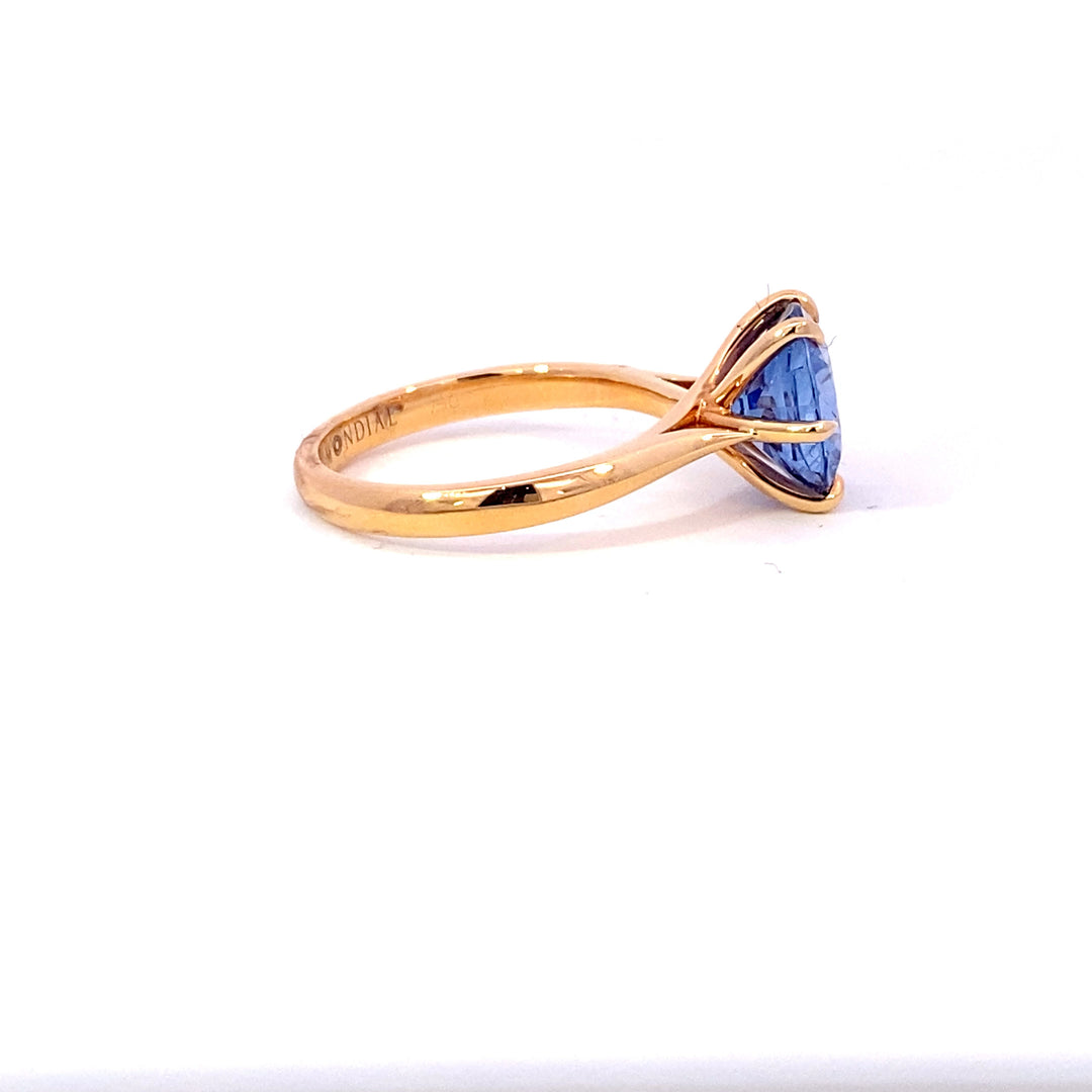 Round brilliant cut Ceylon blue sapphire ring on rose gold band