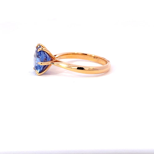 Round brilliant cut Ceylon blue sapphire ring on rose gold band