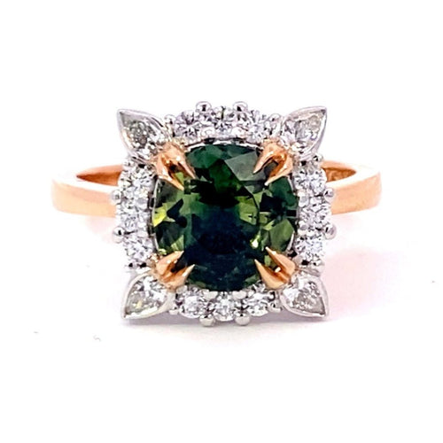 Round brilliant cut green sapphire diamond halo ring on rose gold band