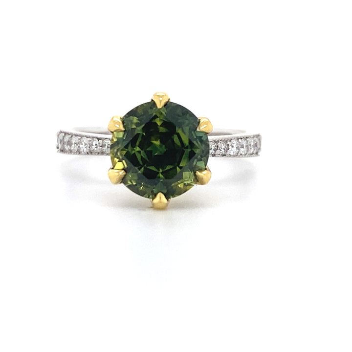 Round brilliant cut green Australian Parti sapphire ring with diamond band