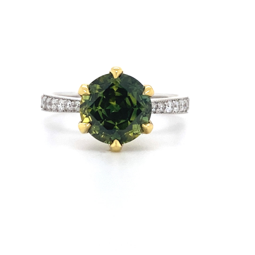 Round brilliant cut green Australian Parti sapphire ring with diamond band