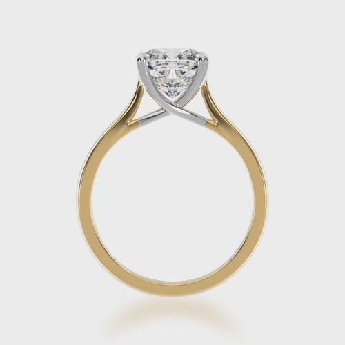 Cushion cut diamond solitaire ring on yellow gold band 3d video